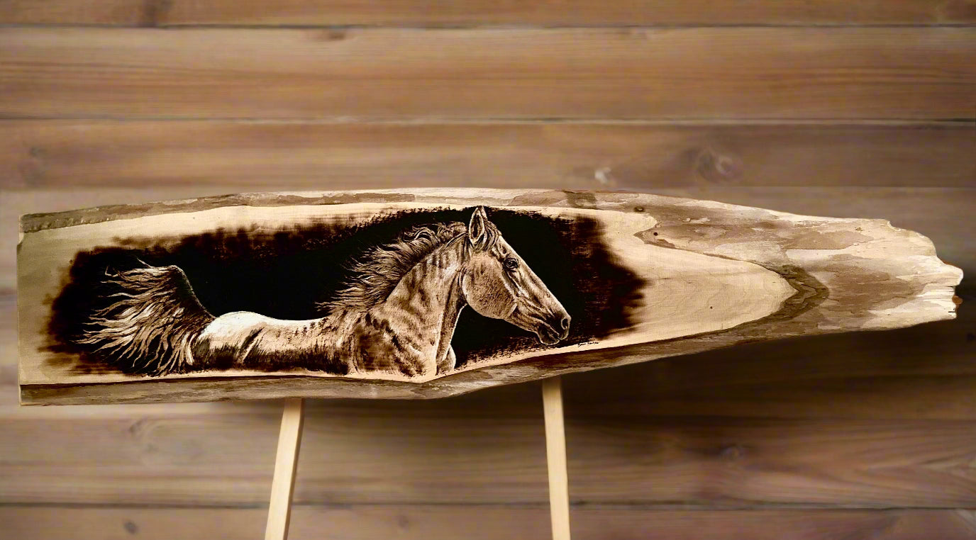 running horse burned or etched into wood